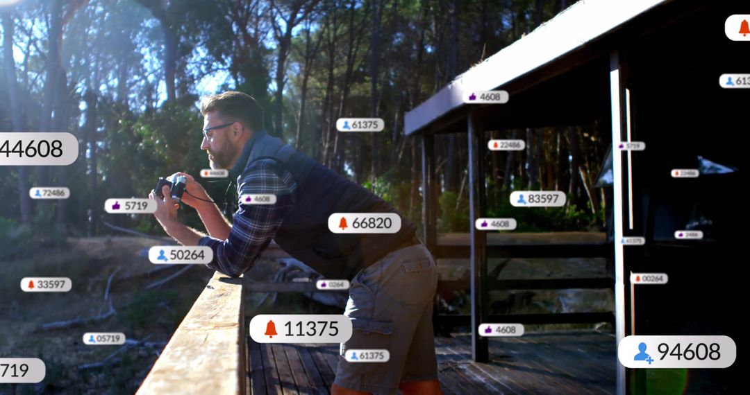 Man Exploring Nature with Camera on Rustic Cabin Deck