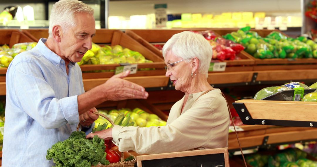 Senior Couple Enjoys Shopping for Fresh Groceries Together