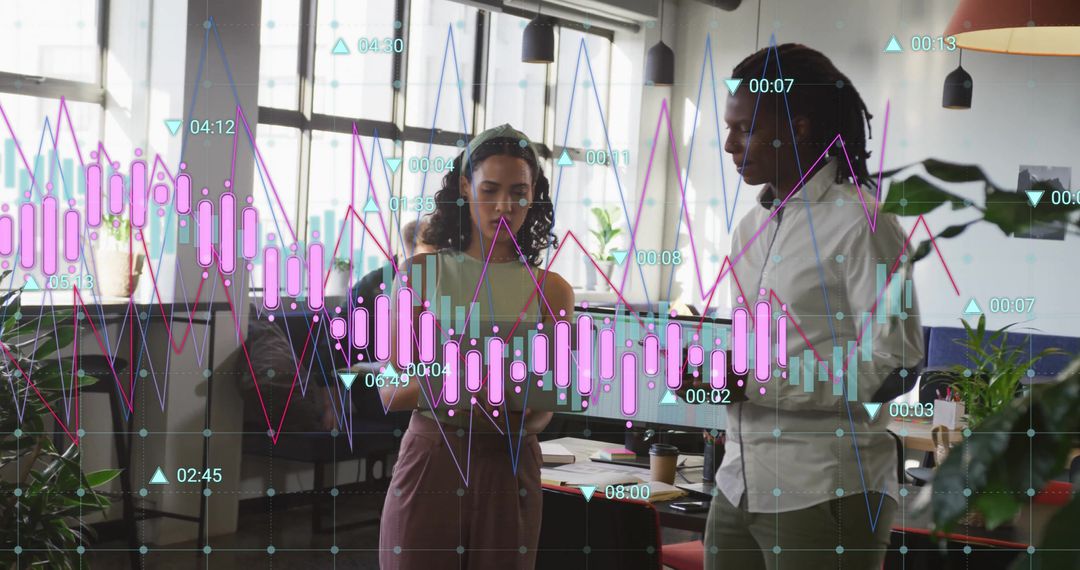 Diverse Business Team Discussing Financial Data Analysis in Modern Office