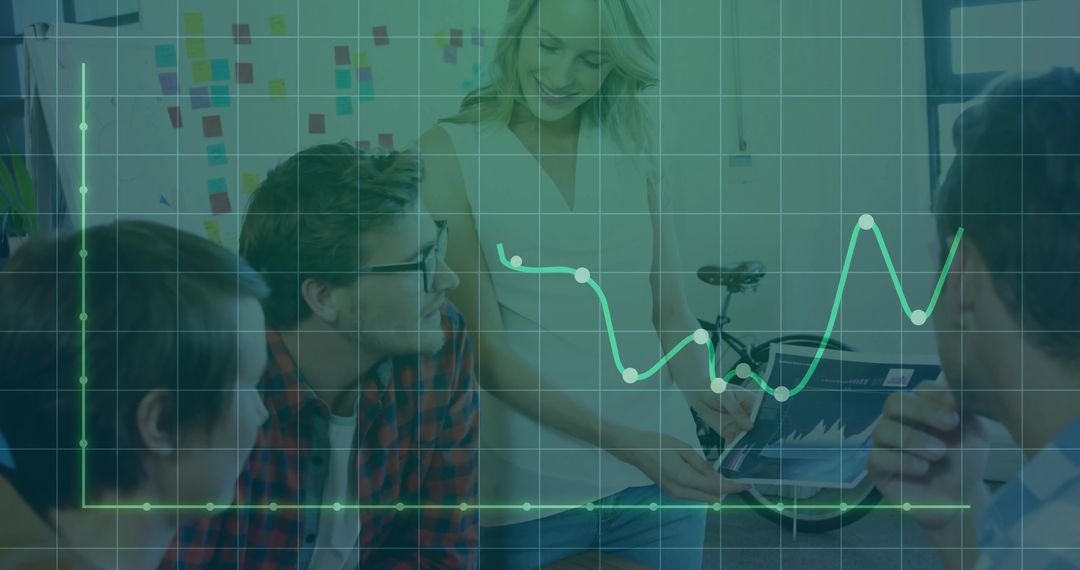 Woman Presenting Graph Analysis to Team in Modern Office