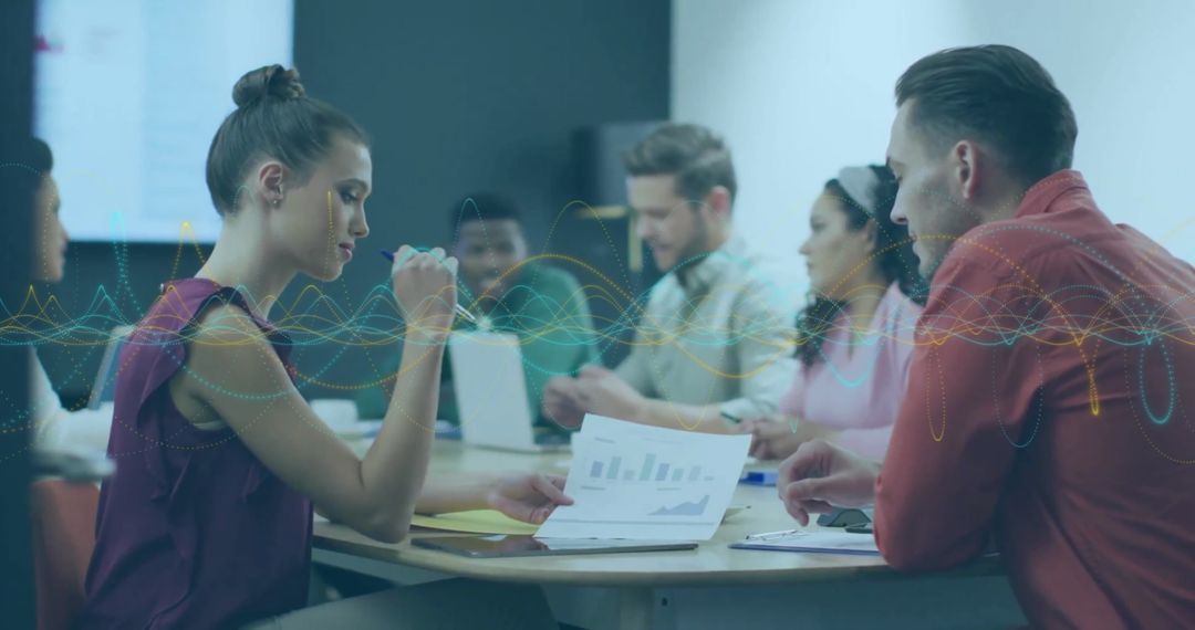 Team Collaborating on Financial Analytics in Modern Office