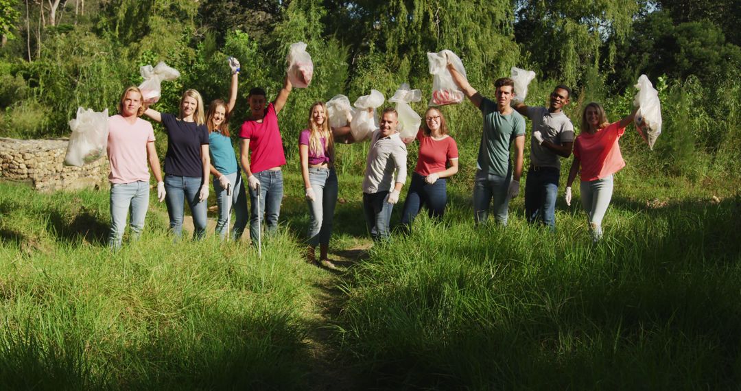 Volunteers Collecting Trash in Park for Community Cleanup - Free Images, Stock Photos and Pictures on Pikwizard.com