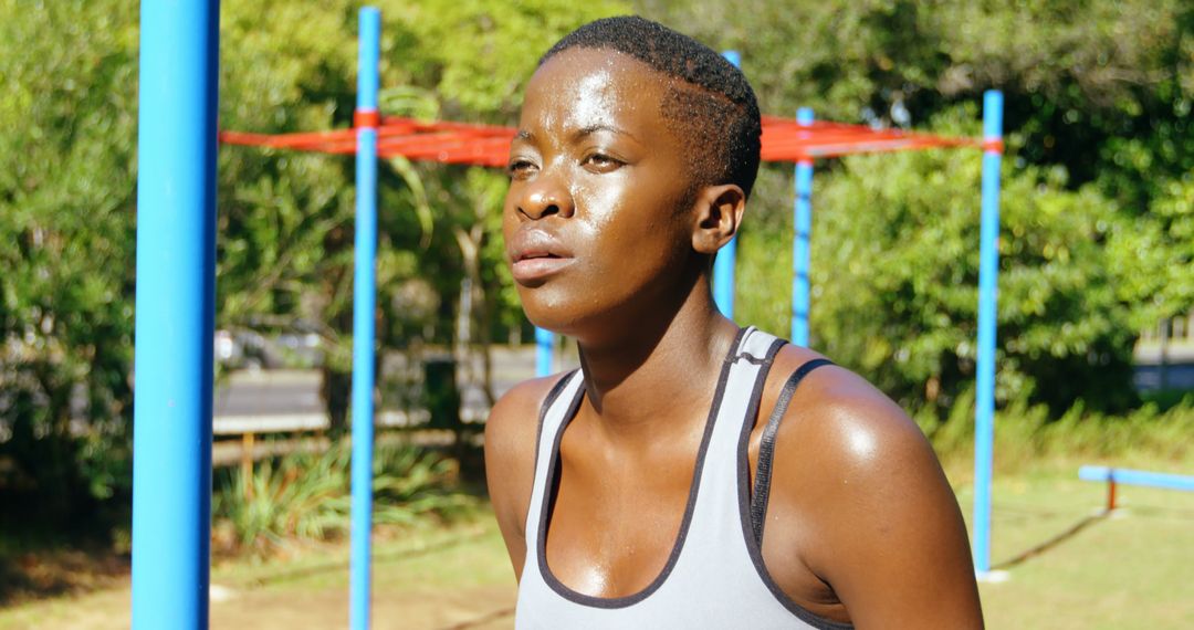 Woman Sweating During Outdoor Workout in the Park - Free Images, Stock Photos and Pictures on Pikwizard.com