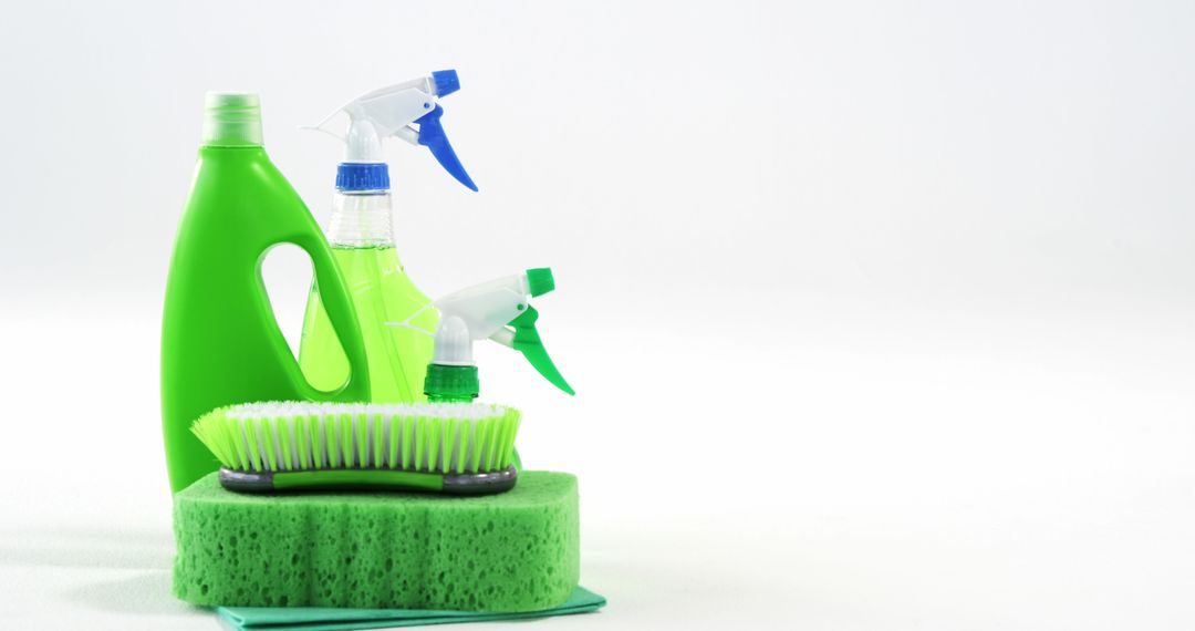 Assorted Green Cleaning Supplies on Light Background - Free Images, Stock Photos and Pictures on Pikwizard.com