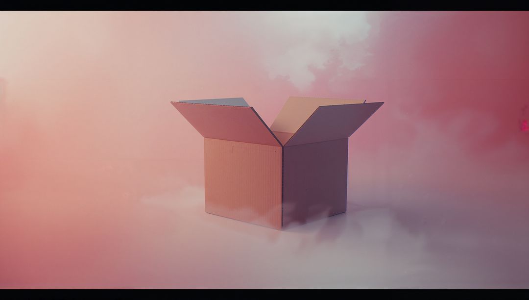 Cardboard Box Floating in Mystical Pastel Atmosphere