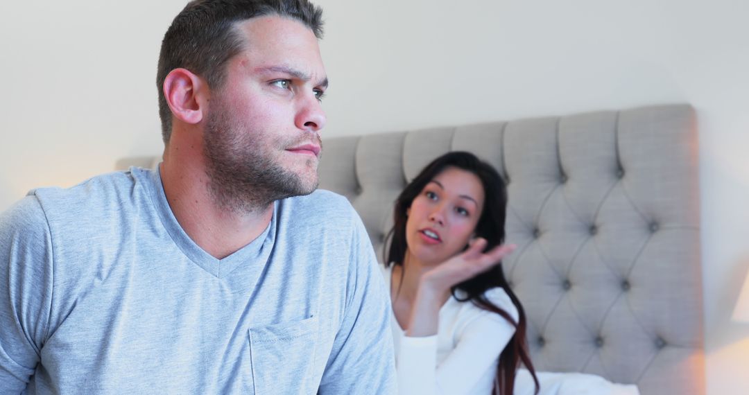 Couple Arguing in Bedroom Showing Relationship Tension - Free Images, Stock Photos and Pictures on Pikwizard.com