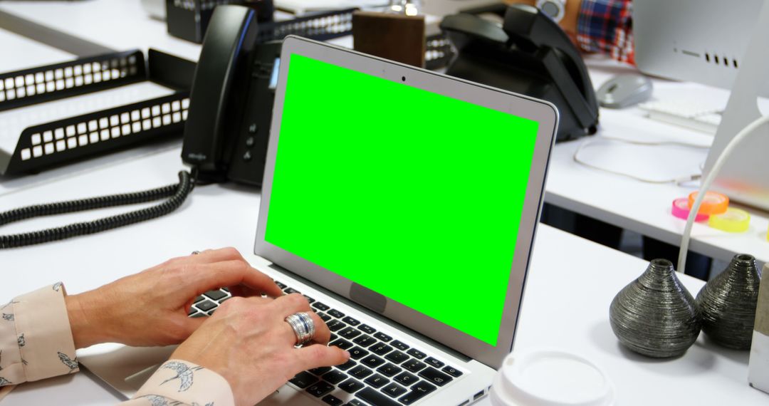 Professional Typing on Laptop with Green Screen at Office Desk - Free Images, Stock Photos and Pictures on Pikwizard.com