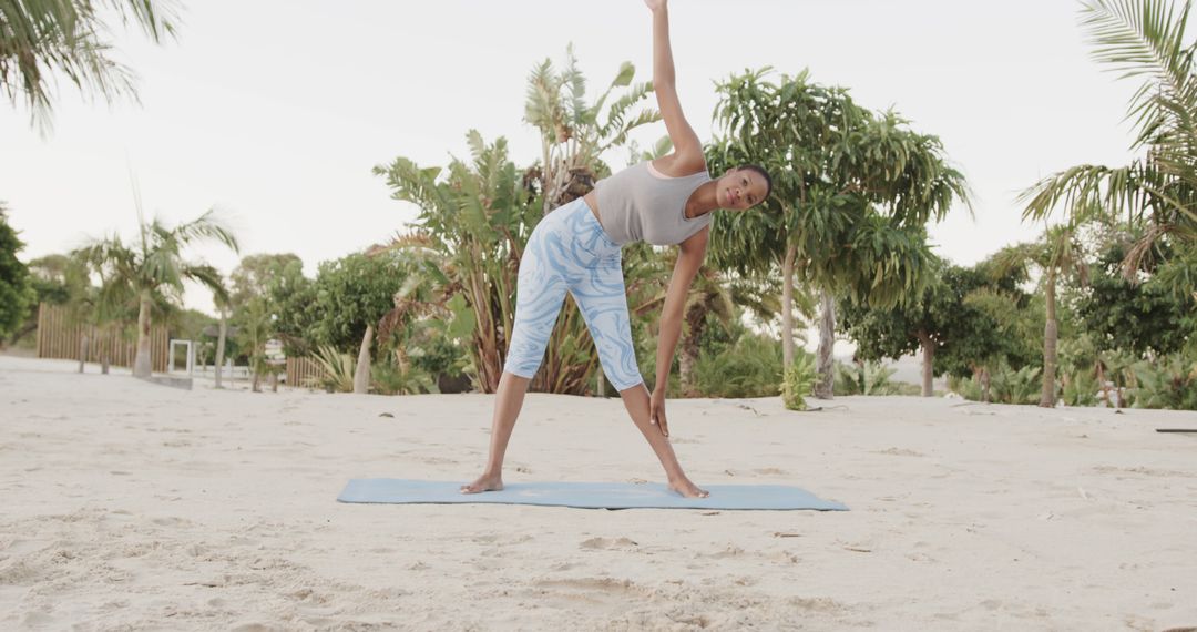 Woman Practicing Outdoor Yoga on Sandy Beach - Free Images, Stock Photos and Pictures on Pikwizard.com