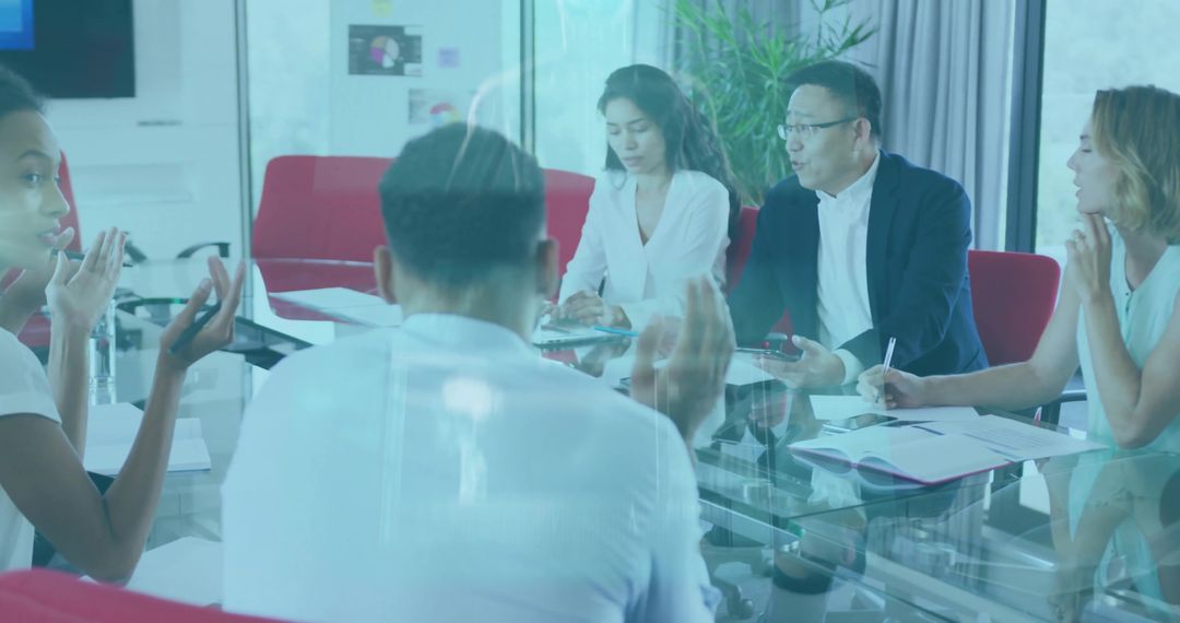 Leading diverse team around glass table in modern office boardroom meeting