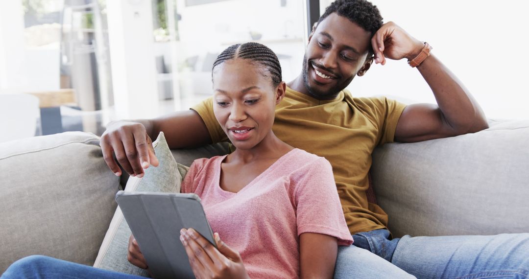 Couple Bonding at Home Using Tablet