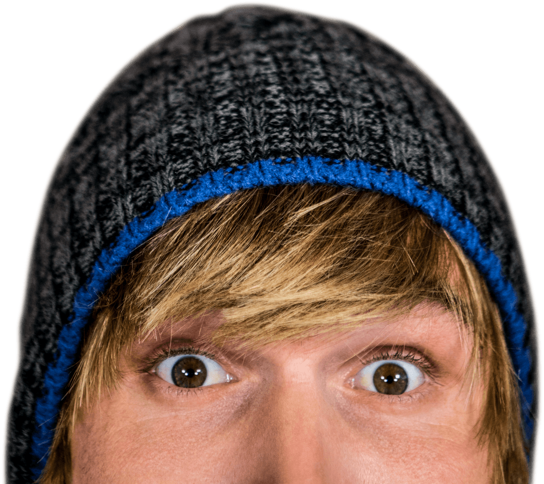 Close-Up of Surprised Hipster Man Staring with Beanie Fashion Style