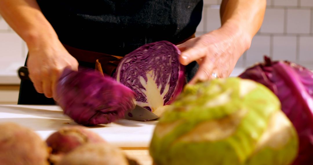 Chef Cutting Red Cabbage in Kitchen for Healthy Meal Preparation - Free Images, Stock Photos and Pictures on Pikwizard.com