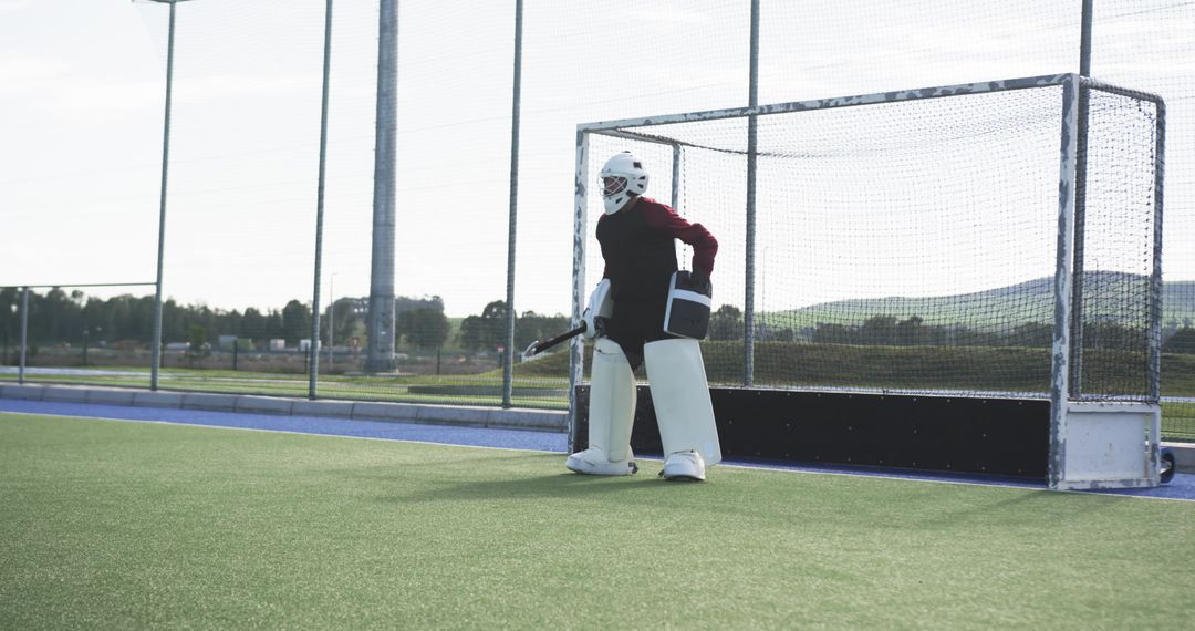 Field Hockey Goalie Equipped and Focused Before Match