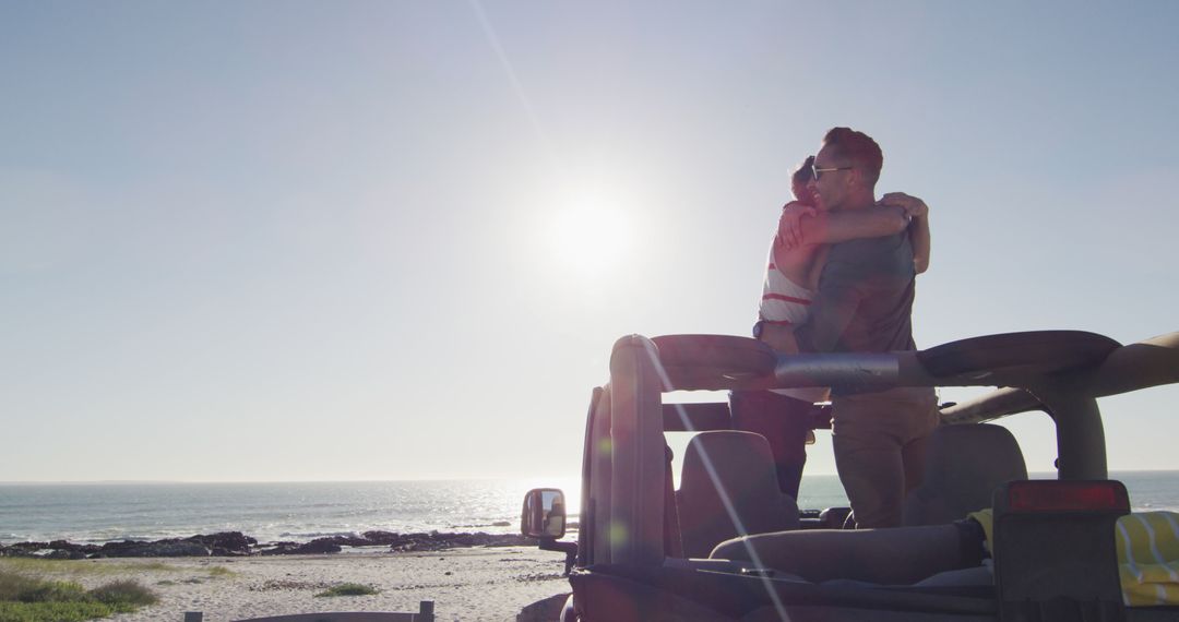 Couple Embracing in Jeep on Beach with Sunlight - Free Images, Stock Photos and Pictures on Pikwizard.com