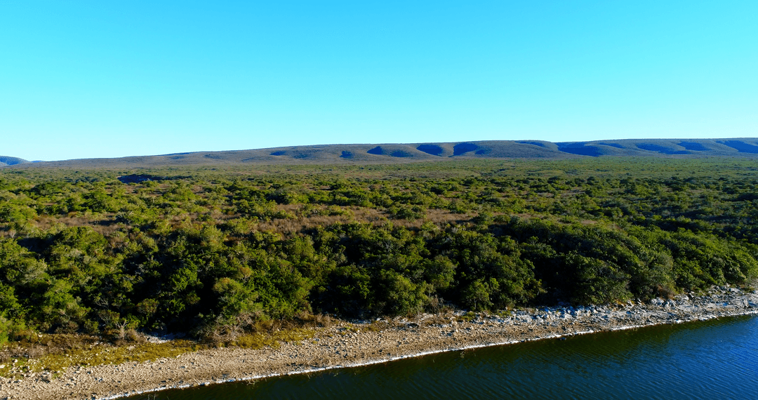 Transparent Skyline Over Pristine Mountainous Coastline