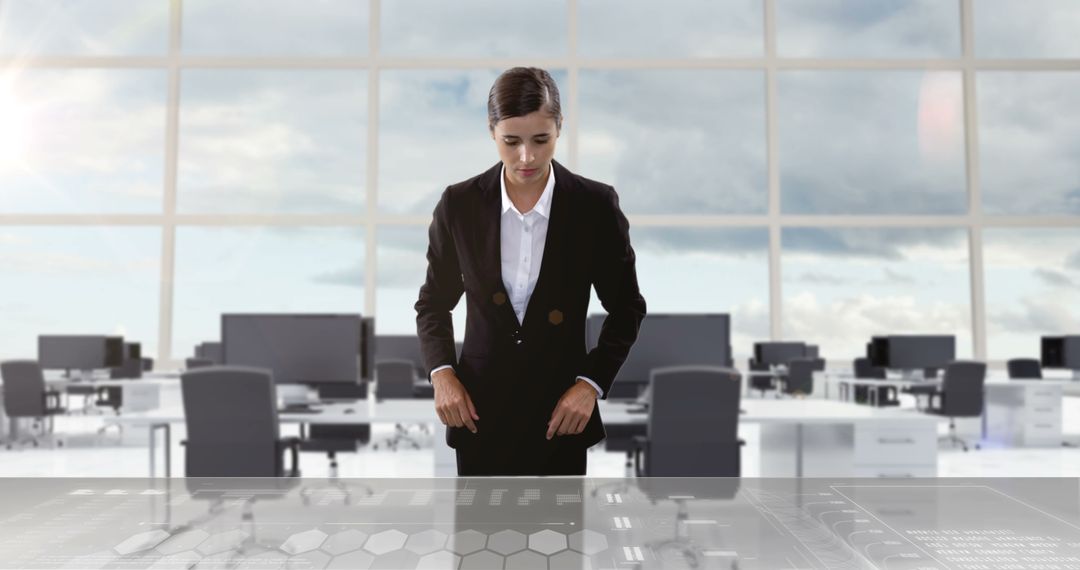 Businesswoman Using Interactive Digital Interface in Modern Office