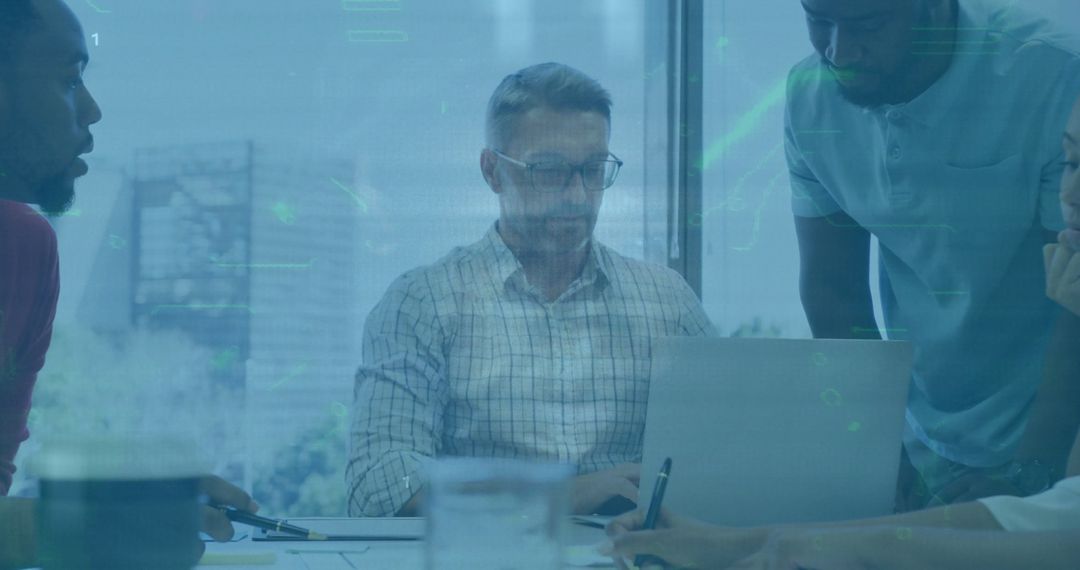 Collaborative Team Analysis with Digital Data Visuals in Modern Office