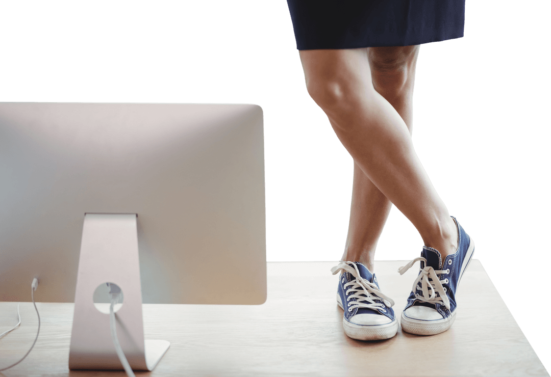 Businesswoman's Legs Shown with Computer on Transparent Background