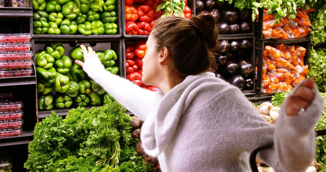 Woman Shopping for Fresh Vegetables in Grocery Store - Free Images, Stock Photos and Pictures on Pikwizard.com