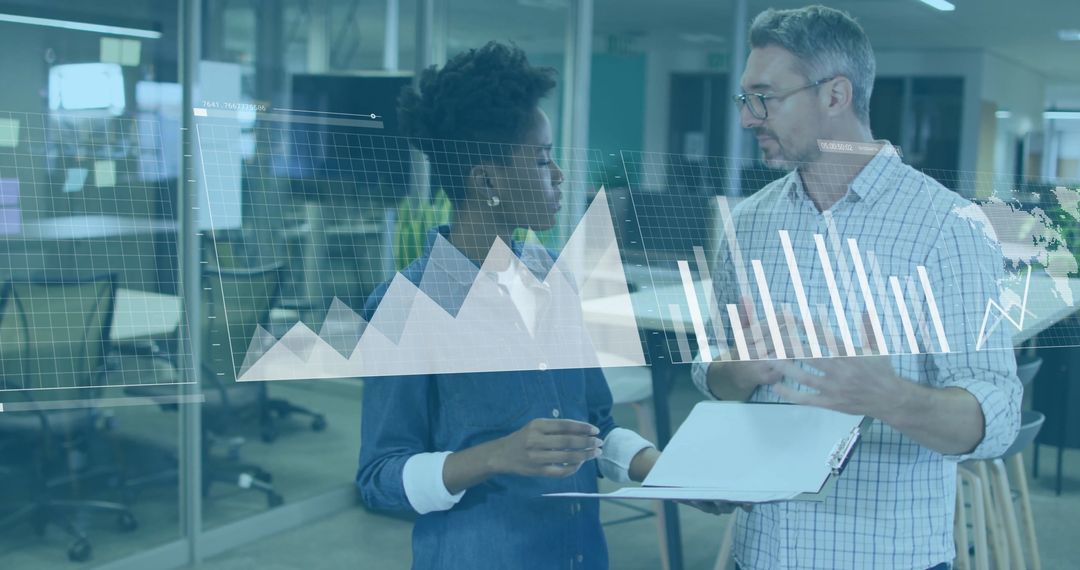 Business Professionals Discussing Graphs for Analytical Solutions