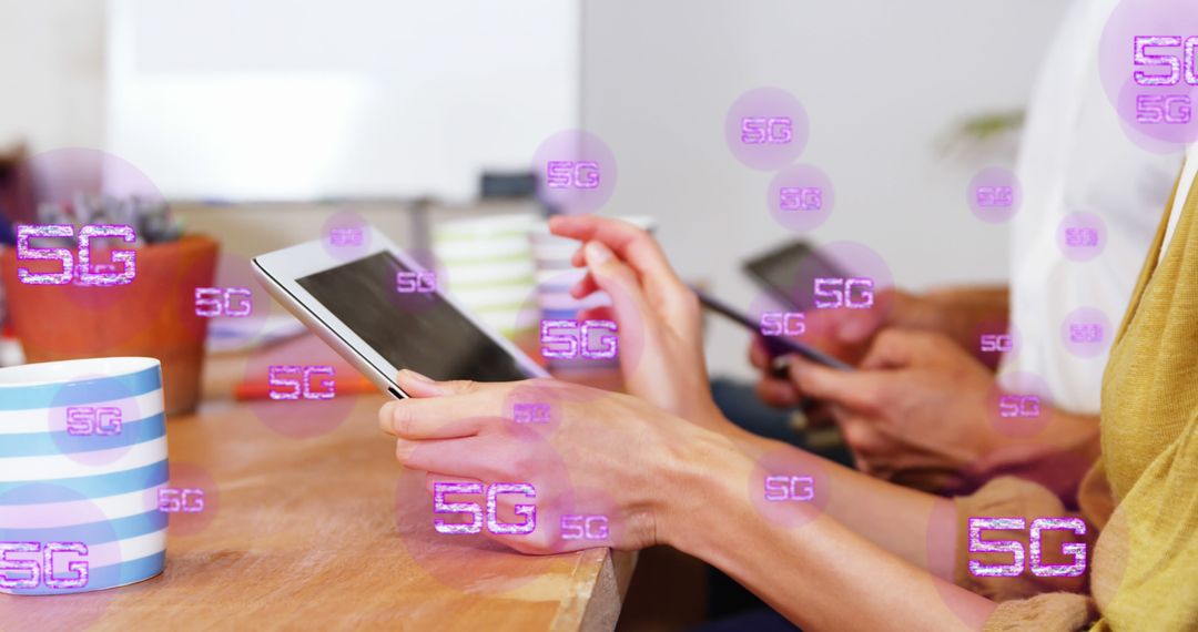 Diverse Coworkers Using Tablets with 5G Technology in Modern Office