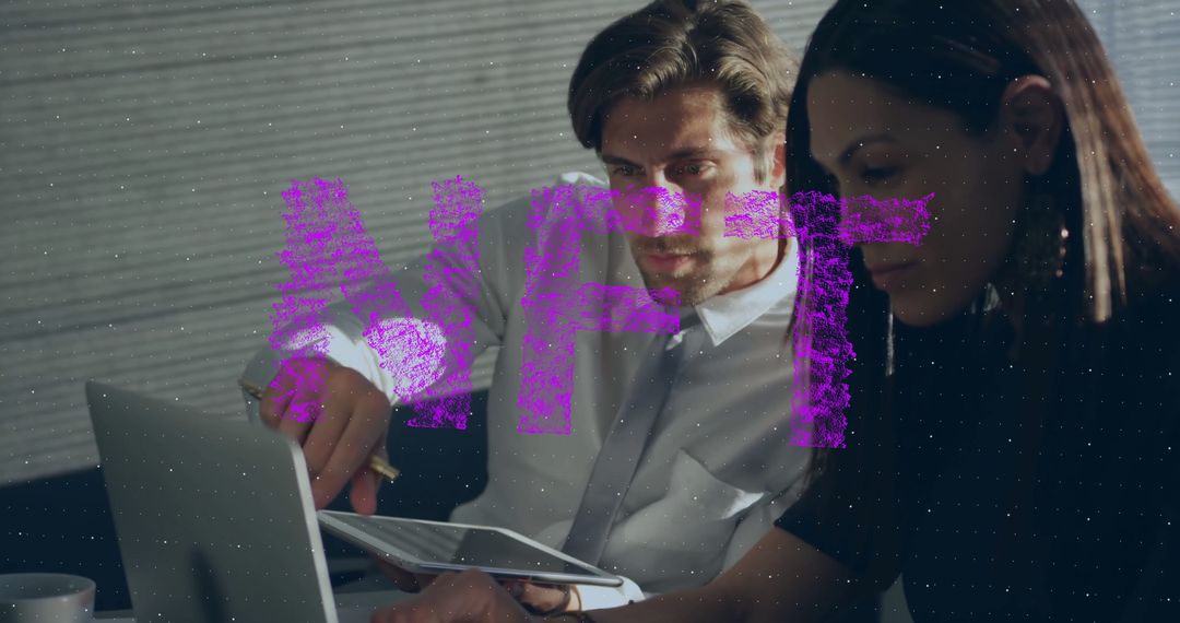 Business Team Analyzing Digital Assets at Office Desk