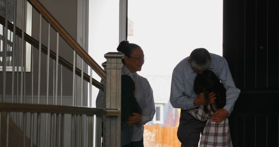 Loving Multi-Generational Family Moment at Home Entryway