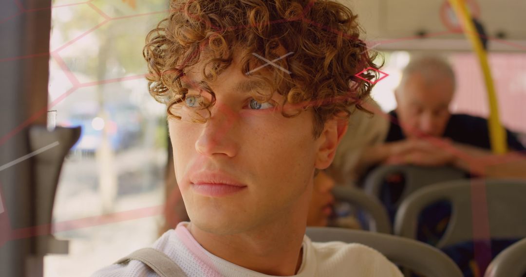 Thoughtful Young Man on Bus Overlaid with Digital Data Graphics