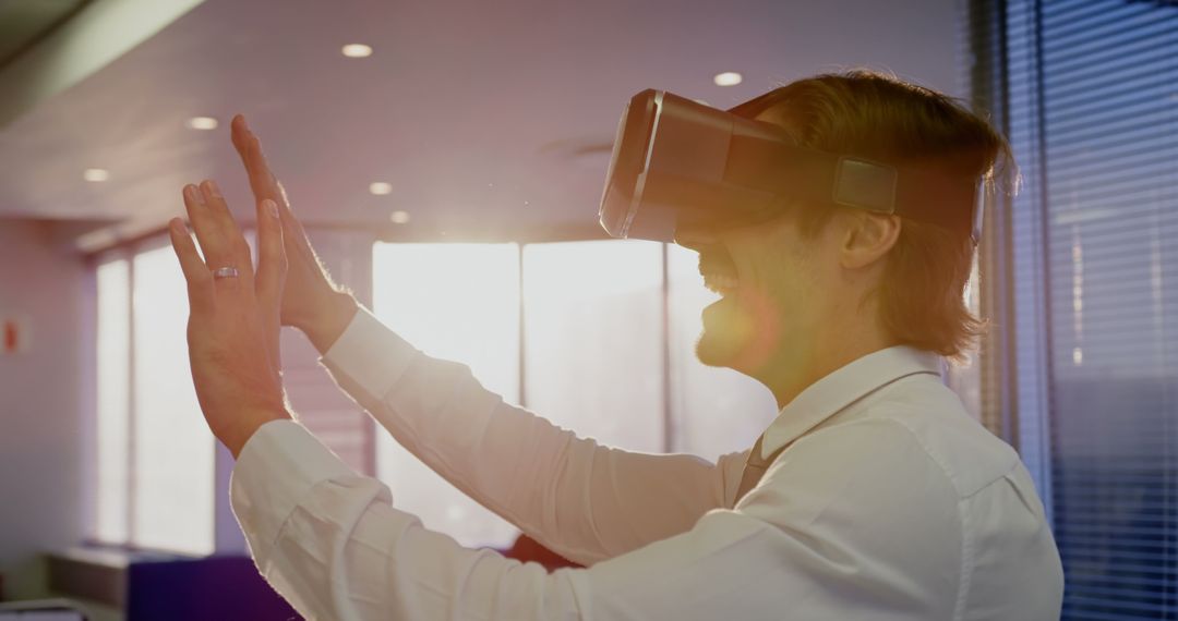 Excited Professional Engages with Virtual Reality Technology at Work