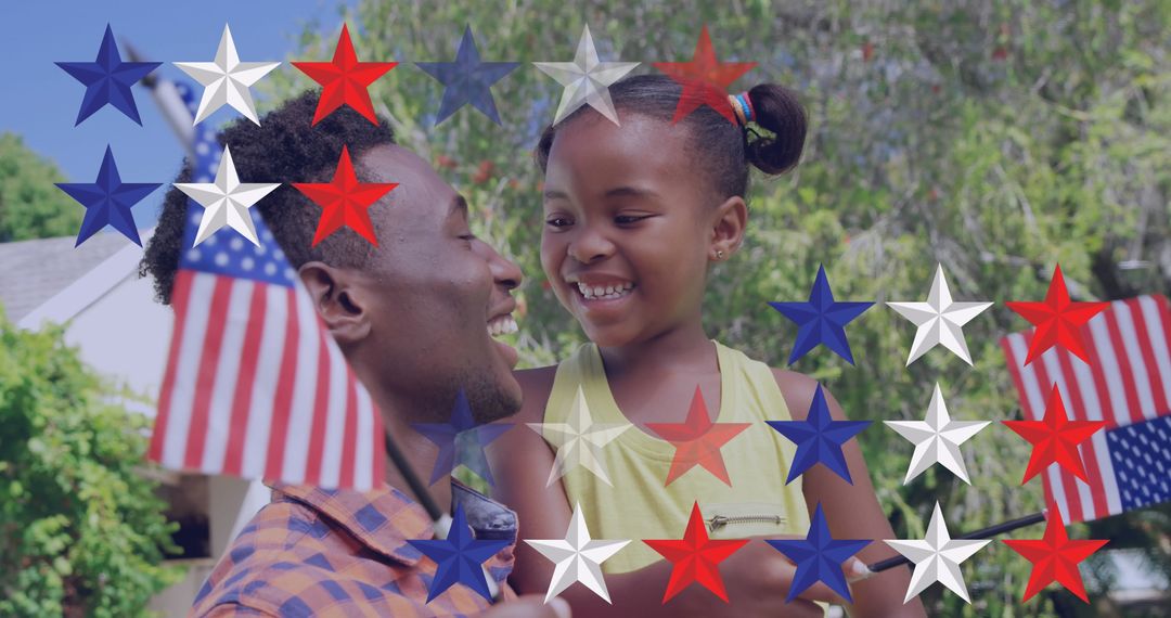 Happy Father and Daughter Celebrating with USA Flags