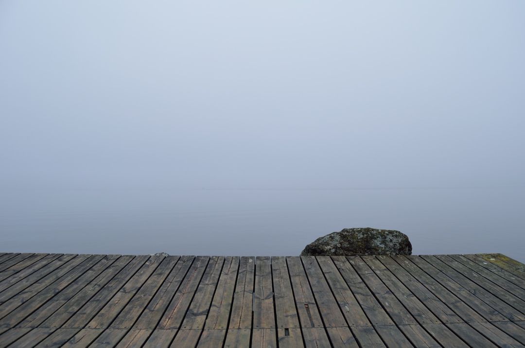 Serene Foggy Lake with Wooden Dock - Free Images, Stock Photos and Pictures on Pikwizard.com