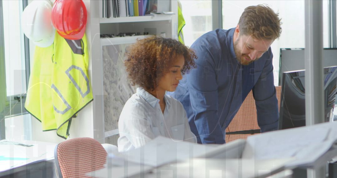 Architects Collaborating in Office with Technical Overlays