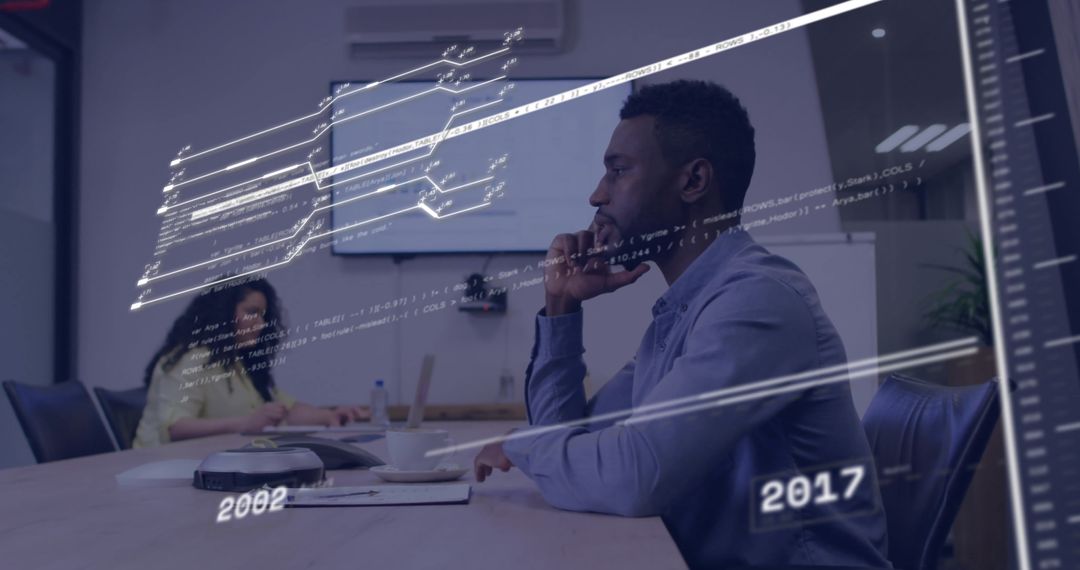 Business Professionals Analyzing Financial Data in Modern Setting