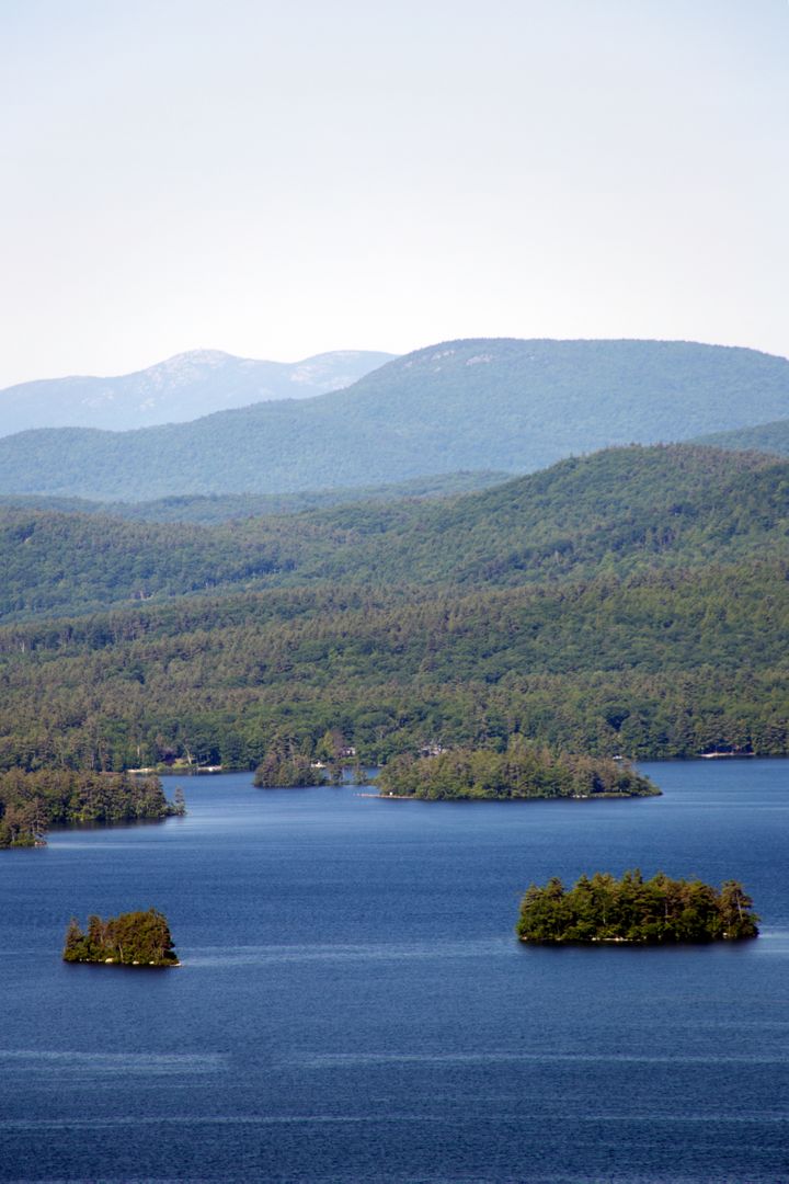 Scenic Mountain Lake with Small Islands - Free Images, Stock Photos and Pictures on Pikwizard.com