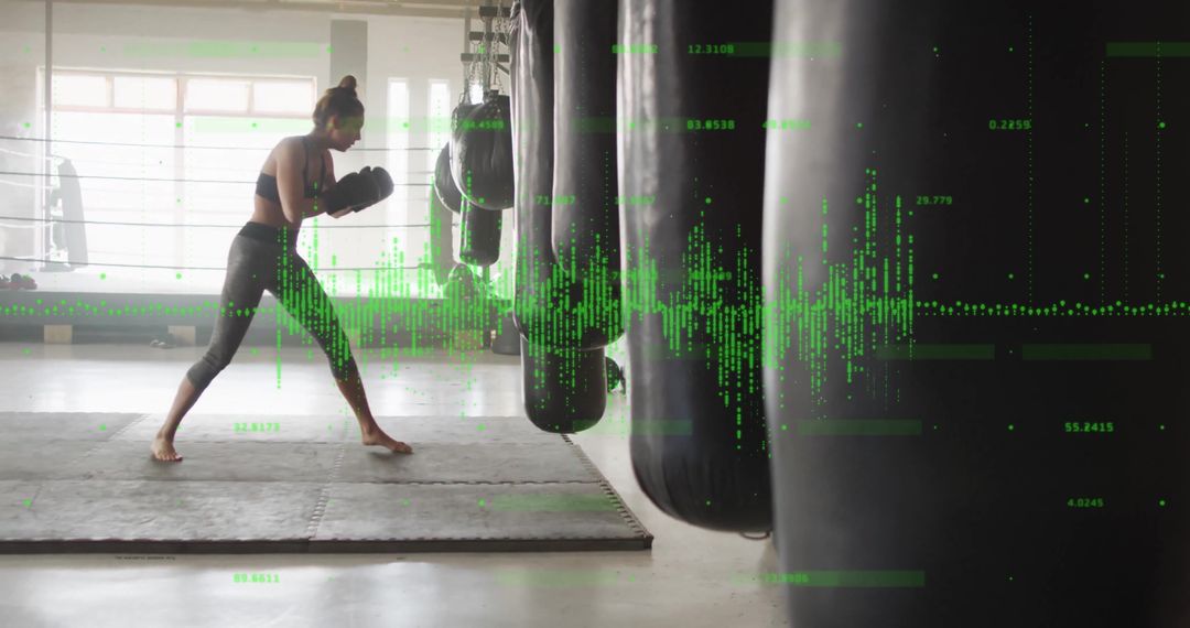 Female Boxer Training with Data Visualization Overlay