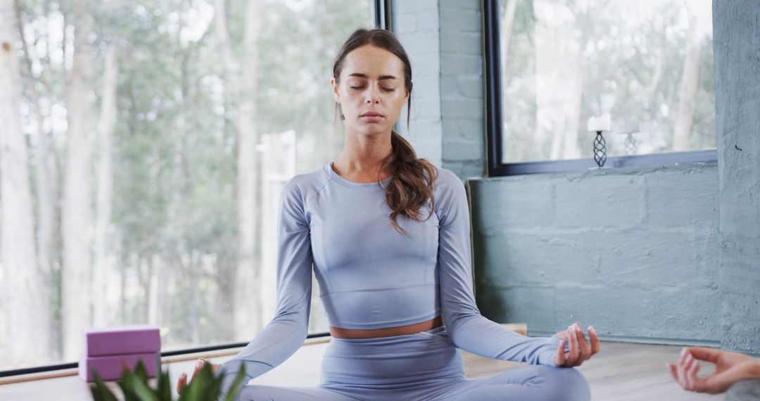 Woman Practicing Yoga Meditation Indoors in Serene Setting - Free Images, Stock Photos and Pictures on Pikwizard.com