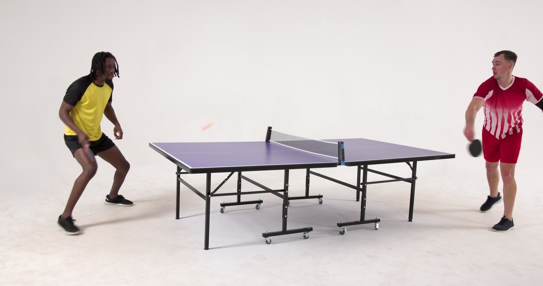 Diverse Friends Enjoy Intense Ping Pong Match