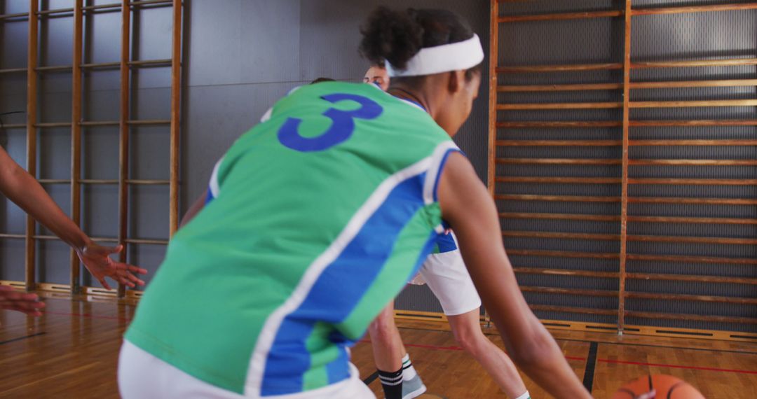 Female Basketball Players Competing in Indoor Match - Free Images, Stock Photos and Pictures on Pikwizard.com