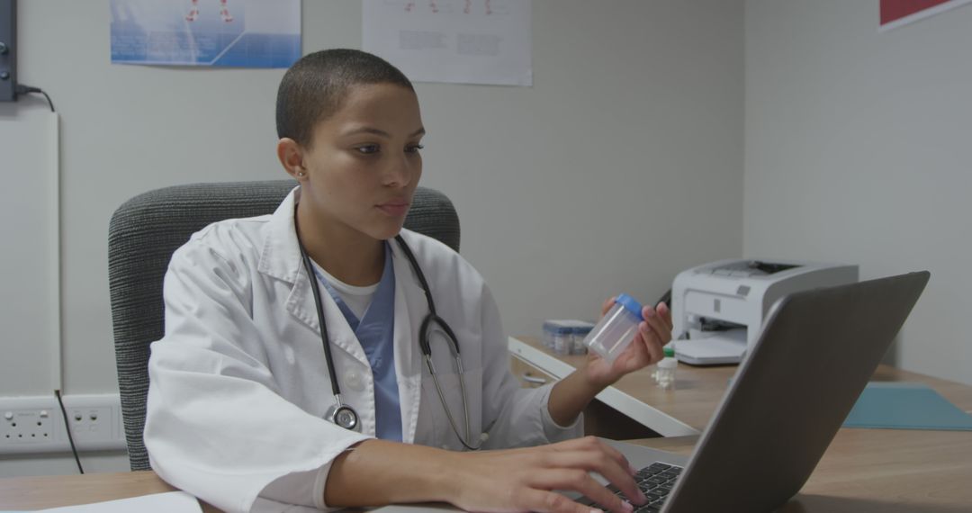 Female Doctor Using Laptop in Office Medical Setting - Free Images, Stock Photos and Pictures on Pikwizard.com