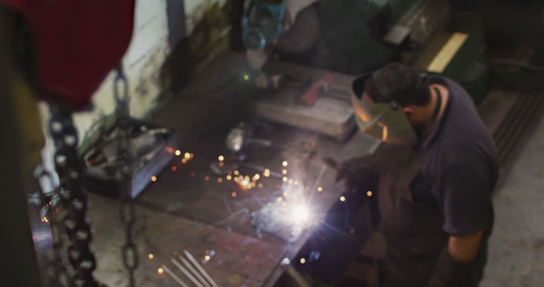 Industrial Worker Welding in Workshop - Free Images, Stock Photos and Pictures on Pikwizard.com