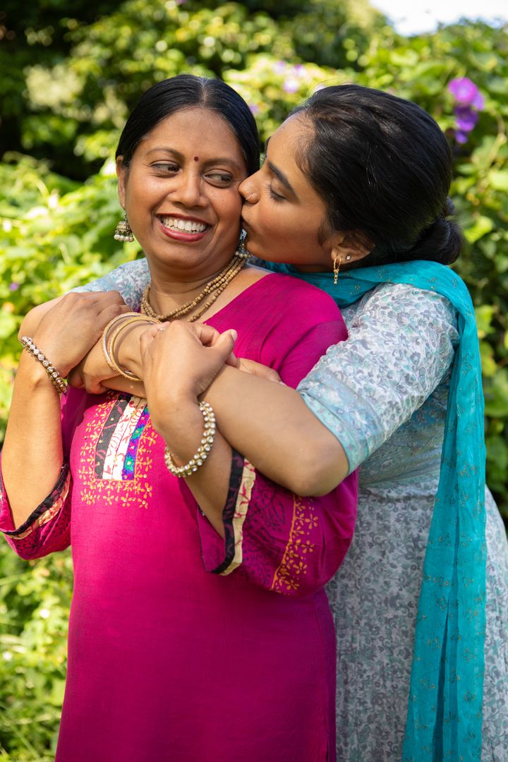 Joyful Moment Between Mother and Daughter in Garden