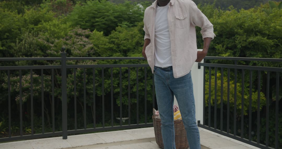 Man setting up outdoor patio for relaxation