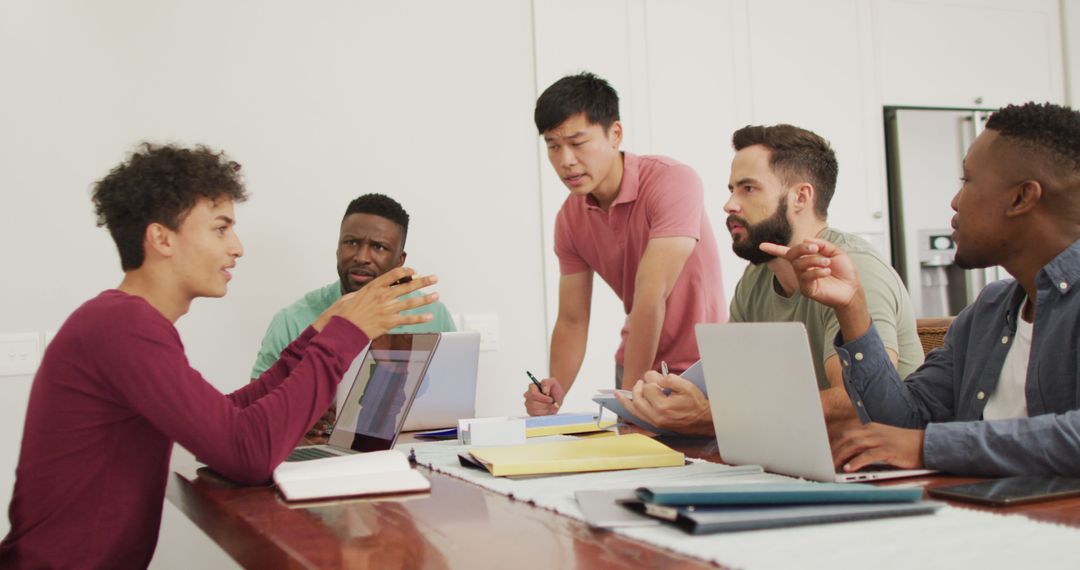 Diverse Group of Friends Socializing and Working Together