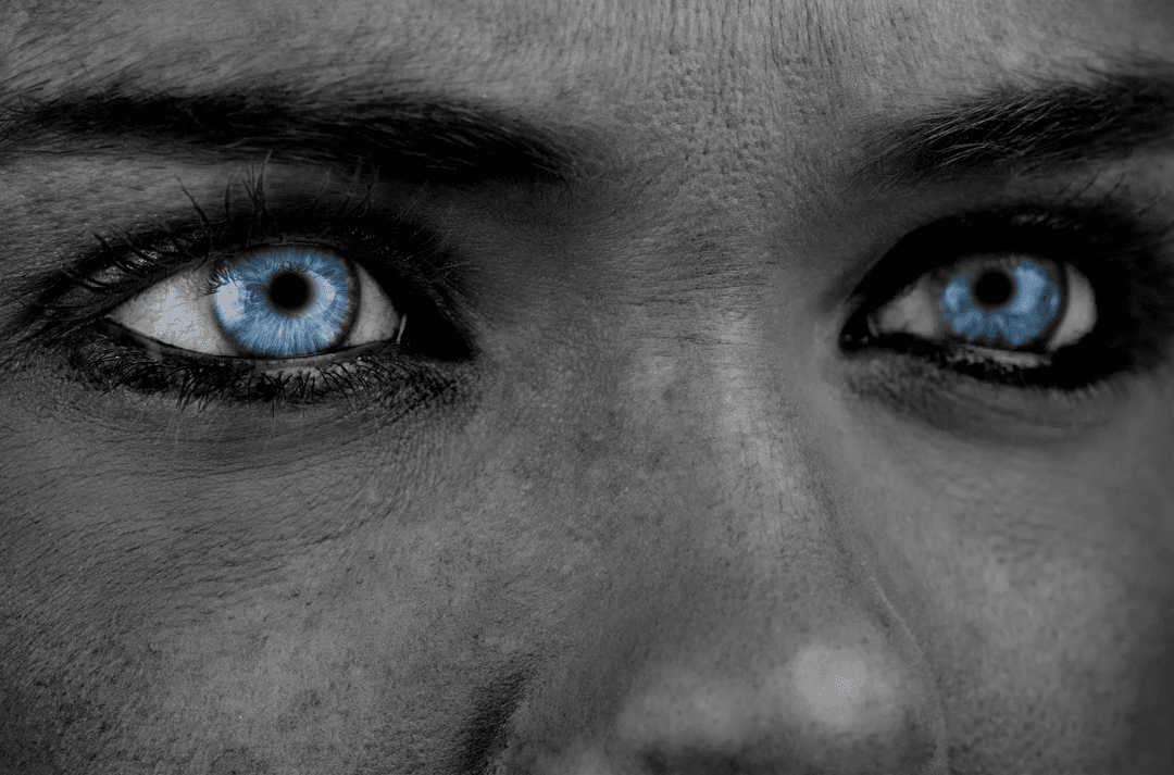Mono Contrast Face with Striking Blue Eyes Transparent Effect
