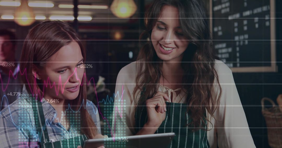 Two Baristas Collaborating and Analyzing Sales Data at Cafe