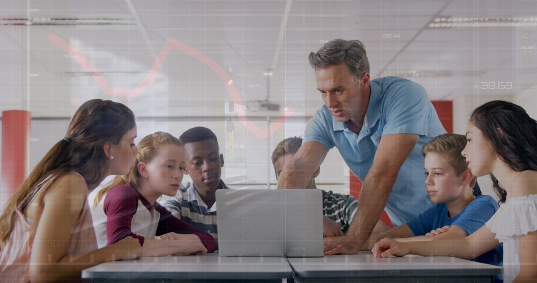 Teacher and Diverse Students Using Laptop for Learning Collaboration