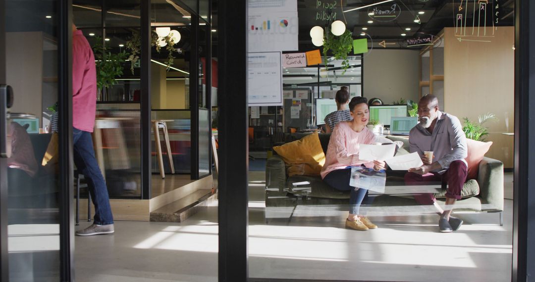Team Collaboration in Contemporary Office on Couch