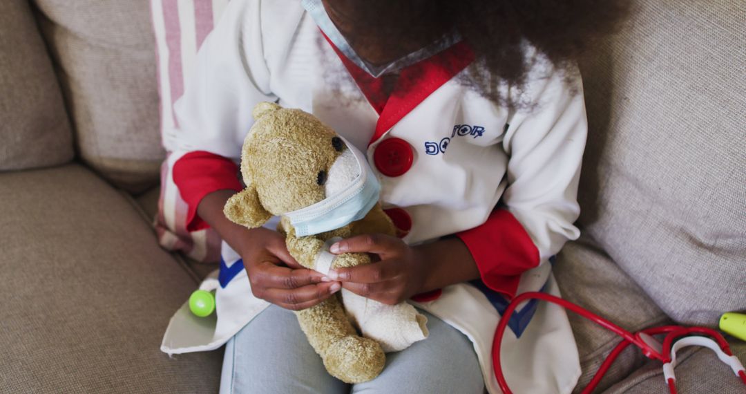 Child Pretending to Be a Doctor with Teddy Bear Patient - Free Images, Stock Photos and Pictures on Pikwizard.com