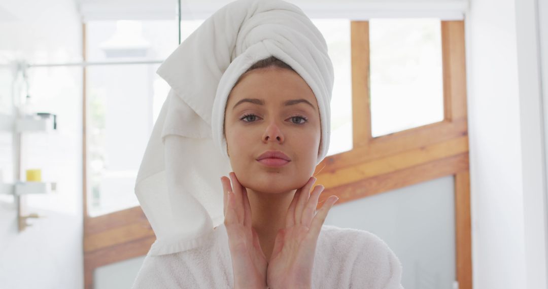 Woman Practicing Skincare Routine With Towel on Head - Free Images, Stock Photos and Pictures on Pikwizard.com