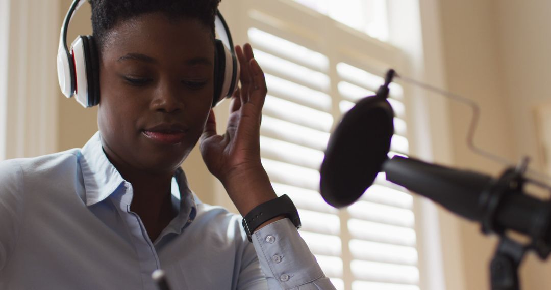 Confident Black Woman Recording Podcast with Microphone - Free Images, Stock Photos and Pictures on Pikwizard.com